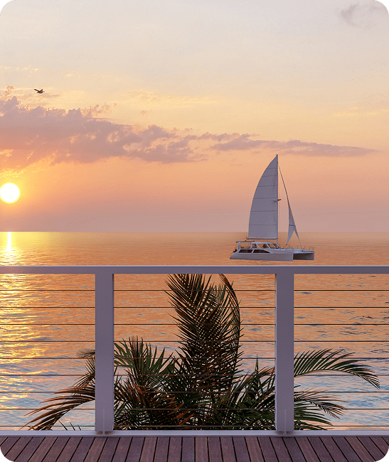 Rectangle 81 Sailboat on ocean at sunset, palm foreground.